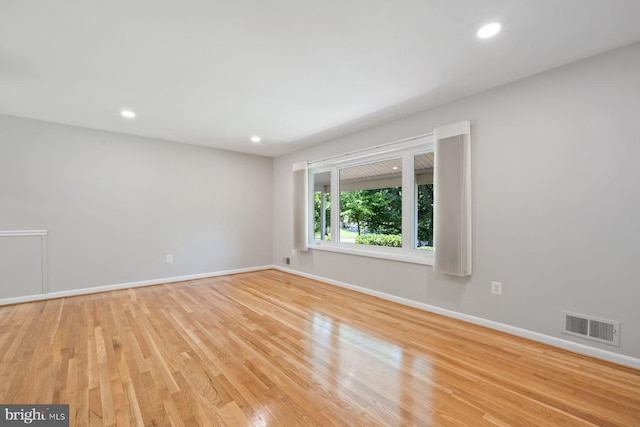 1515 Ainsley Rd, Silver Spring, MD 20904 - unfurnished room with baseboards, wood finished floors, and recessed lighting