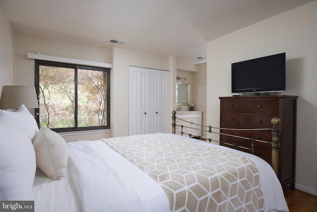 10893 Deborah Dr, Potomac, MD 20854 - bedroom with a closet, wood finished floors, and baseboards