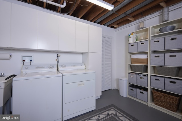 10893 Deborah Dr, Potomac, MD 20854 - washroom with washing machine and clothes dryer and cabinet space