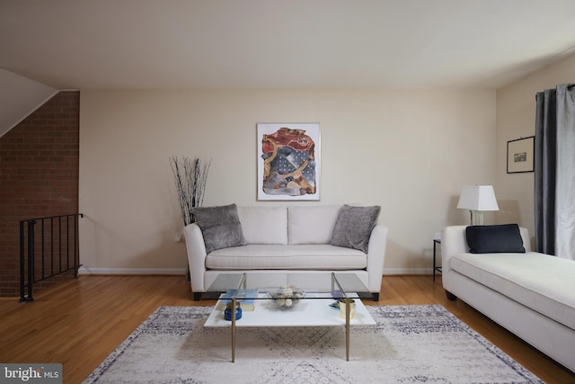 10893 Deborah Dr, Potomac, MD 20854 - living room featuring wood finished floors, baseboards, and lofted ceiling