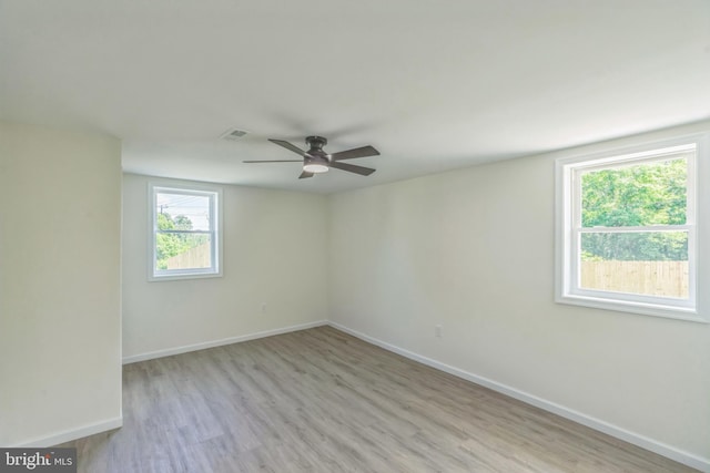 13029 Clarion Rd, Fort Washington, MD 20744 - spare room with light wood-style floors, a ceiling fan, and baseboards