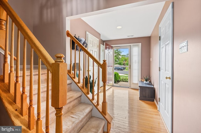 233 Windsor Ct, Quakertown, PA 18951 - foyer entrance with light wood-style flooring, stairs, and baseboards