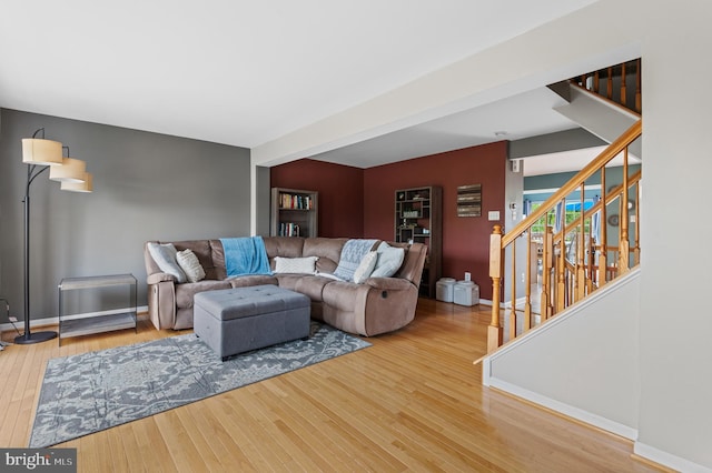 233 Windsor Ct, Quakertown, PA 18951 - living room featuring wood finished floors, stairway, and baseboards
