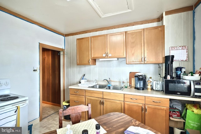 533 W Broadway, Red Lion, PA 17356 - kitchen with white electric range, light countertops, and a sink