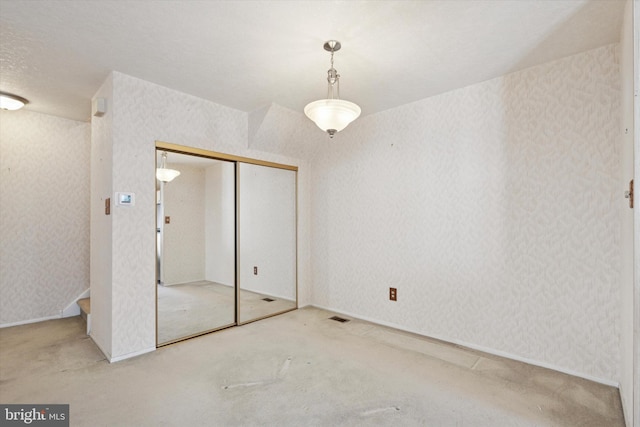 9363 Neil Rd Unit A, Philadelphia, PA 19115 - unfurnished bedroom featuring carpet, a closet, and wallpapered walls