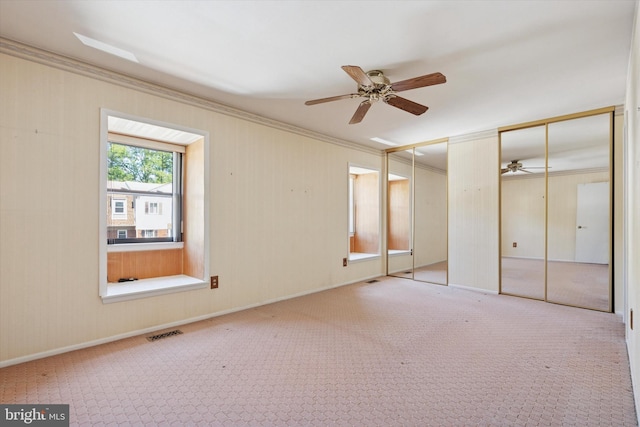 9363 Neil Rd Unit A, Philadelphia, PA 19115 - unfurnished bedroom featuring two closets, ornamental molding, carpet, and a ceiling fan