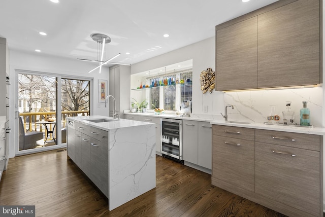 2186 Chesapeake Harbour Dr E, Annapolis, MD 21403 - kitchen with beverage cooler, a sink, modern cabinets, dark wood-style floors, and recessed lighting
