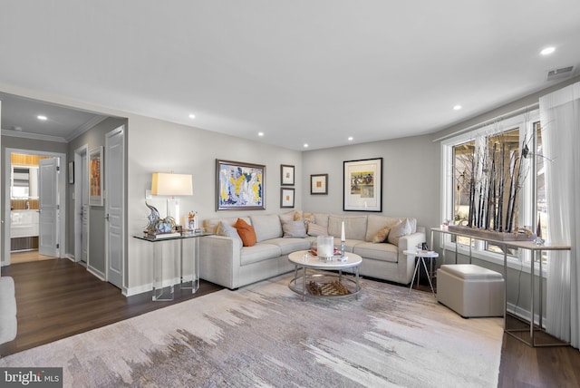 2186 Chesapeake Harbour Dr E, Annapolis, MD 21403 - living area featuring wood finished floors, healthy amount of natural light, recessed lighting, crown molding, and baseboards