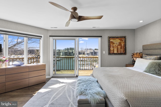 2186 Chesapeake Harbour Dr E, Annapolis, MD 21403 - bedroom featuring access to outside, wood finished floors, a water view, and ceiling fan