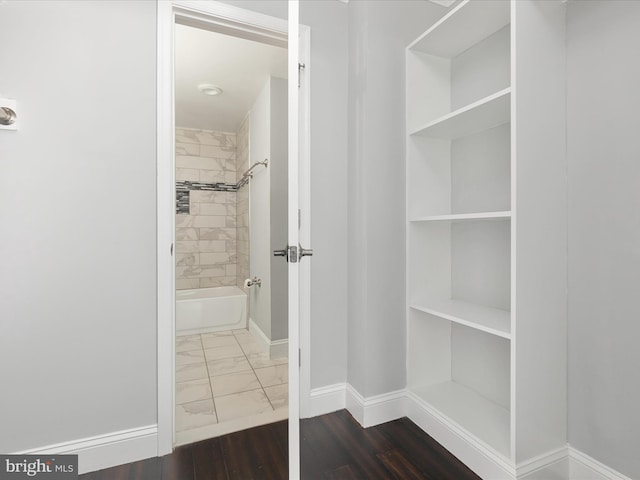 4141 N Henderson Rd N Unit 809, Arlington, VA 22203 - bathroom with baseboards, marble look tile flooring, and shower / tub combination