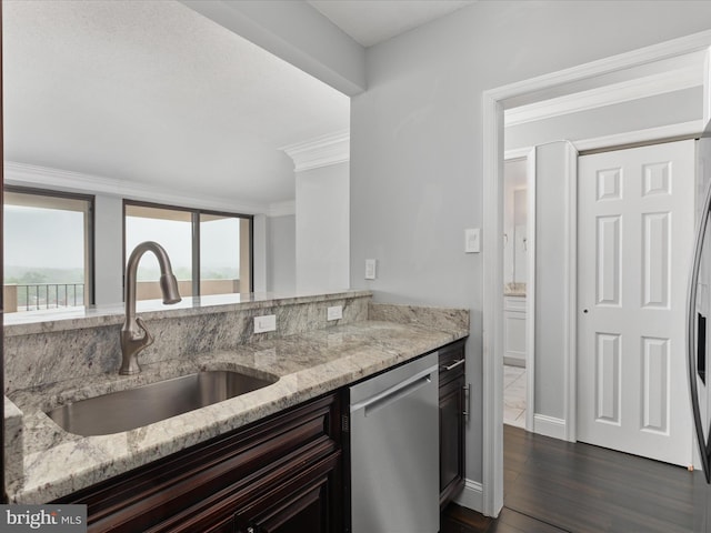 4141 N Henderson Rd N Unit 809, Arlington, VA 22203 - kitchen with stainless steel dishwasher, a sink, light stone countertops, crown molding, and dark wood finished floors