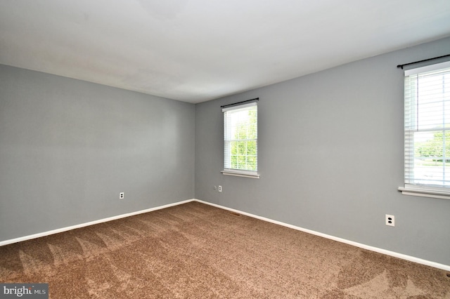 313 Christopher Ct, Lansdale, PA 19446 - unfurnished room with dark carpet, plenty of natural light, and baseboards