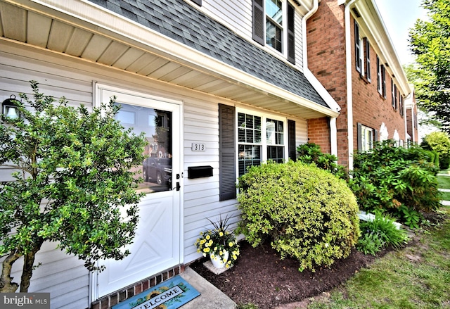 313 Christopher Ct, Lansdale, PA 19446 - property entrance featuring a shingled roof and brick siding