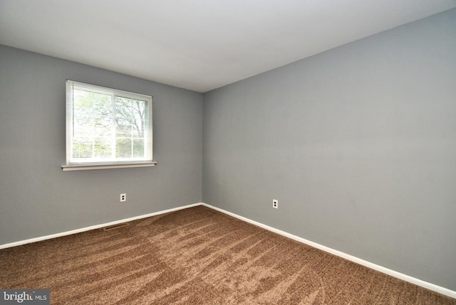 313 Christopher Ct, Lansdale, PA 19446 - empty room featuring dark carpet and baseboards