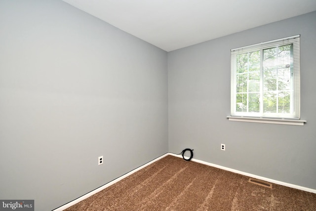 313 Christopher Ct, Lansdale, PA 19446 - empty room featuring dark colored carpet and baseboards