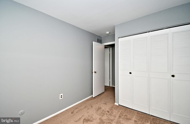 313 Christopher Ct, Lansdale, PA 19446 - unfurnished bedroom with light carpet, a closet, and baseboards