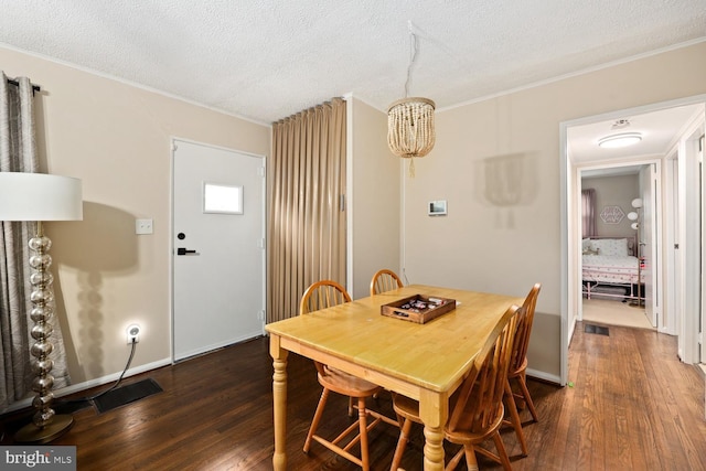 35 Holly Corner Rd, Fredericksburg, VA 22406 - dining space featuring dark wood finished floors, crown molding, and a textured ceiling