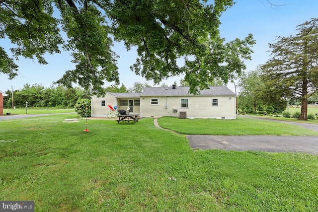35 Holly Corner Rd, Fredericksburg, VA 22406 - rear view of house featuring a yard and central AC