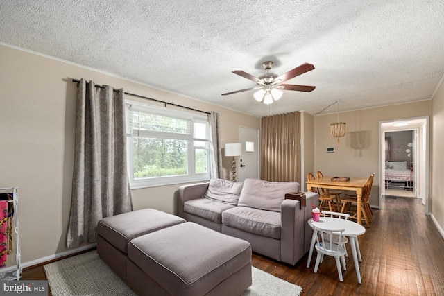 35 Holly Corner Rd, Fredericksburg, VA 22406 - living room with ceiling fan, dark wood-style floors, a textured ceiling, and baseboards