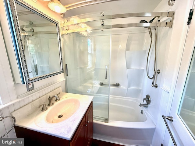 9733 Narragansett Pkwy, College Park, MD 20740 - bathroom featuring vanity and shower / bath combination with glass door
