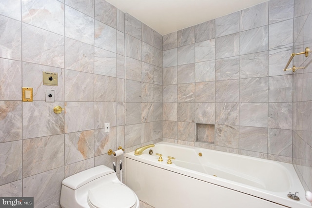 3801 Canterbury Rd Unit 817, Baltimore, MD 21218 - full bath with tile walls, a tub to relax in, and toilet