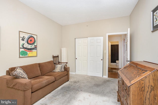 3801 Canterbury Rd Unit 817, Baltimore, MD 21218 - carpeted living area with baseboards