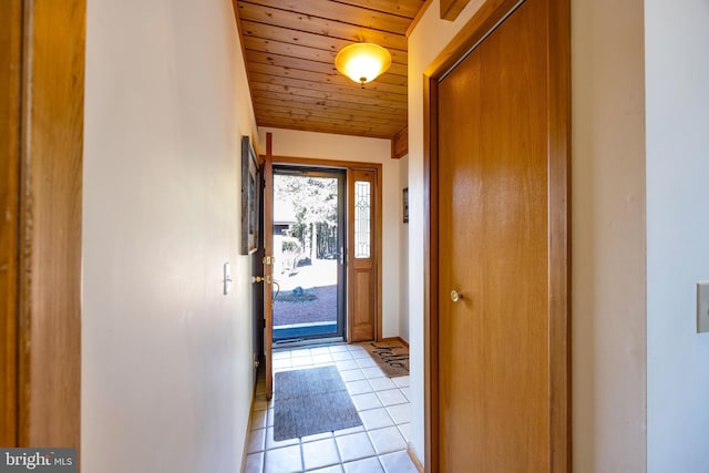 105 Fern Creek Ln, Martinsburg, WV 25404 - doorway to outside with wood ceiling, light tile patterned floors, and baseboards