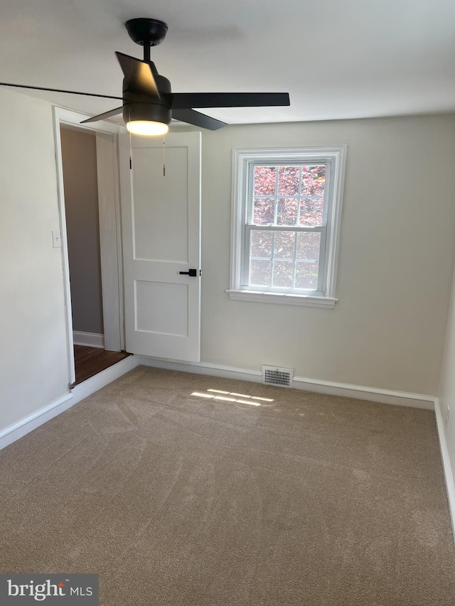 1537 W High St, Haddon Heights, NJ 08035 - unfurnished bedroom featuring baseboards, carpet floors, and ceiling fan