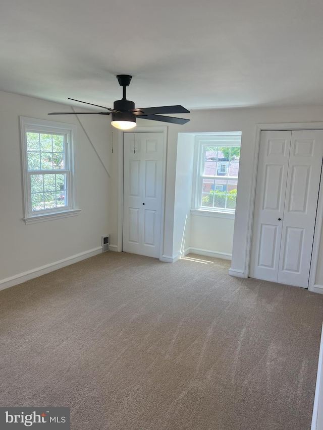 1537 W High St, Haddon Heights, NJ 08035 - unfurnished bedroom featuring carpet floors, baseboards, and ceiling fan