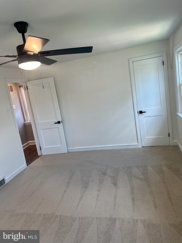 1537 W High St, Haddon Heights, NJ 08035 - spare room featuring ceiling fan, carpet floors, and baseboards