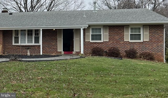 17600 Wheat Fall Dr, Derwood, MD 20855 - ranch-style home with brick siding, a front yard, and roof with shingles
