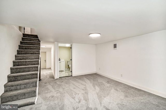 7731 Fayette St, Philadelphia, PA 19150 - finished basement with stairway, carpet floors, and baseboards