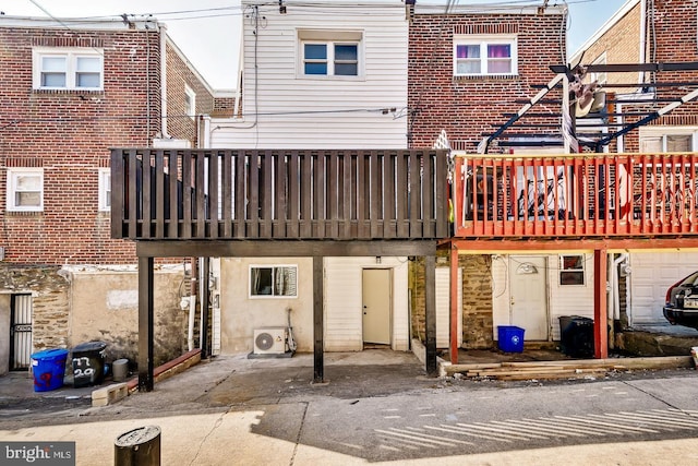 7731 Fayette St, Philadelphia, PA 19150 - rear view of house with a cooling unit and brick siding