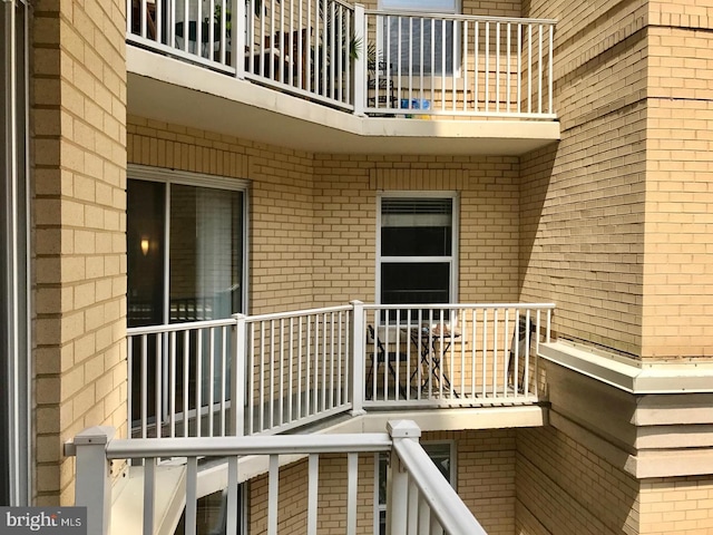 1111 11th St NW Unit 307, Washington, DC 20001 - doorway to property featuring a balcony and brick siding