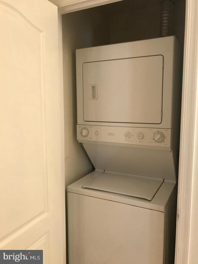 1111 11th St NW Unit 307, Washington, DC 20001 - laundry area with stacked washer and clothes dryer