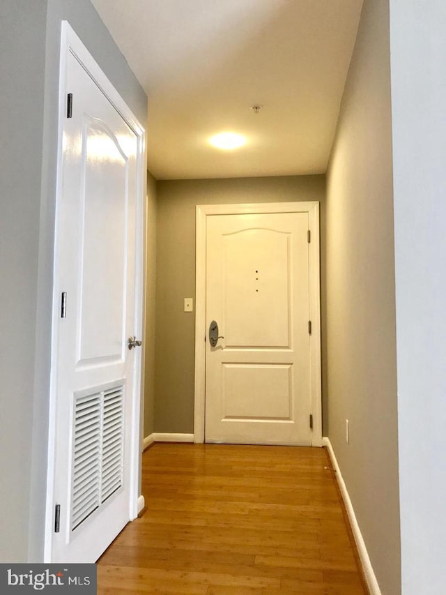 1111 11th St NW Unit 307, Washington, DC 20001 - corridor with light wood-type flooring and baseboards
