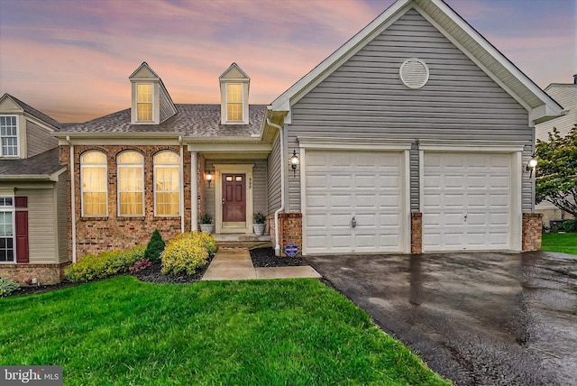 259 Prospect Cir Unit 8, Shrewsbury, PA 17361 - view of front of property featuring driveway, a garage, brick siding, a front yard, and a shingled roof