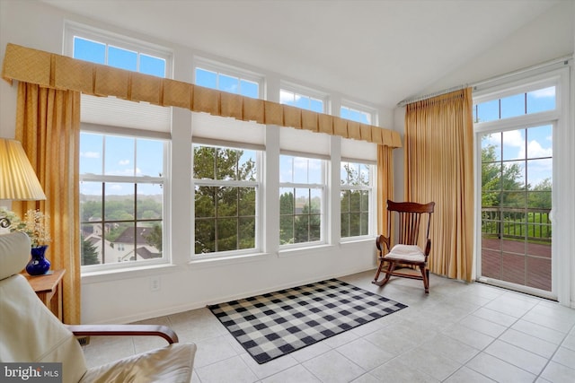 259 Prospect Cir Unit 8, Shrewsbury, PA 17361 - sunroom with tile patterned floors, healthy amount of natural light, lofted ceiling, and baseboards