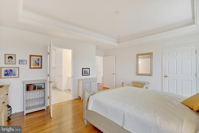 259 Prospect Cir Unit 8, Shrewsbury, PA 17361 - bedroom with a raised ceiling and light wood-style flooring