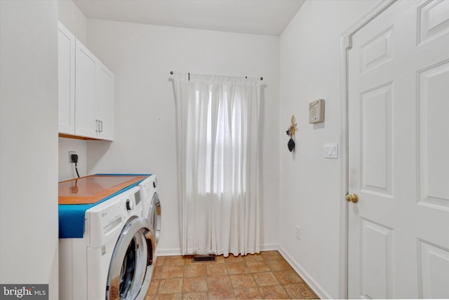 259 Prospect Cir Unit 8, Shrewsbury, PA 17361 - laundry room featuring separate washer and dryer, baseboards, and light stone finish flooring