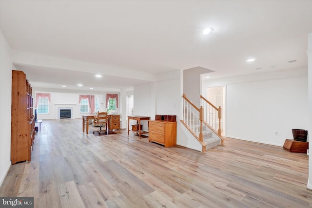259 Prospect Cir Unit 8, Shrewsbury, PA 17361 - living area with stairway, light wood-style flooring, recessed lighting, a fireplace, and baseboards