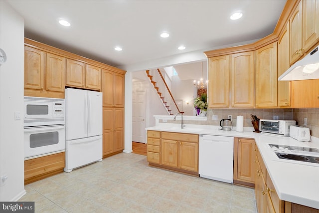 259 Prospect Cir Unit 8, Shrewsbury, PA 17361 - kitchen with white appliances, light brown cabinetry, backsplash, light countertops, and recessed lighting