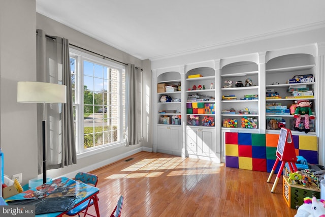 12801 Willow Marsh Ln, Bowie, MD 20720 - recreation room with wood-type flooring and baseboards