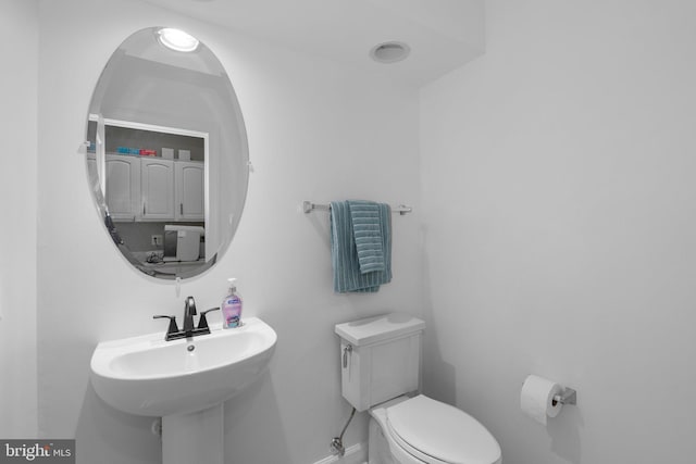 12801 Willow Marsh Ln, Bowie, MD 20720 - bathroom featuring toilet and baseboards