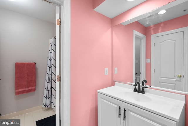 12801 Willow Marsh Ln, Bowie, MD 20720 - full bathroom with vanity, baseboards, and a shower with curtain