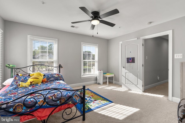 12801 Willow Marsh Ln, Bowie, MD 20720 - carpeted bedroom with baseboards and ceiling fan