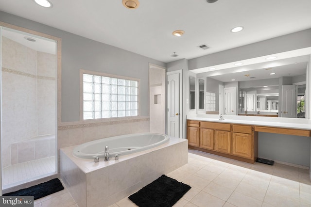 12801 Willow Marsh Ln, Bowie, MD 20720 - full bath featuring a garden tub, vanity, tile patterned floors, and recessed lighting