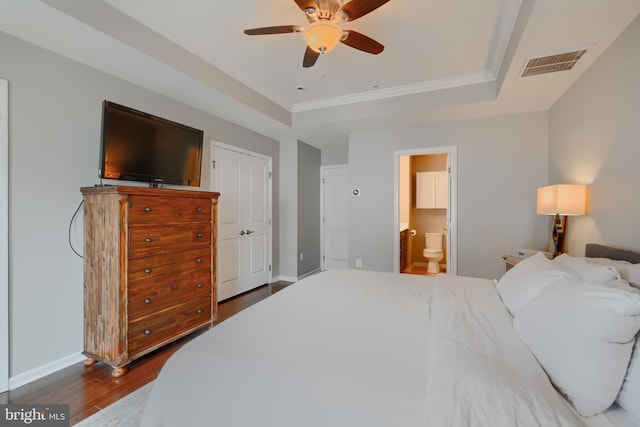 888 S Macon St, Baltimore, MD 21224 - bedroom featuring a tray ceiling, wood finished floors, ornamental molding, baseboards, and ensuite bathroom