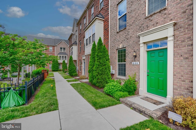 888 S Macon St, Baltimore, MD 21224 - entrance to property featuring brick siding and a residential view