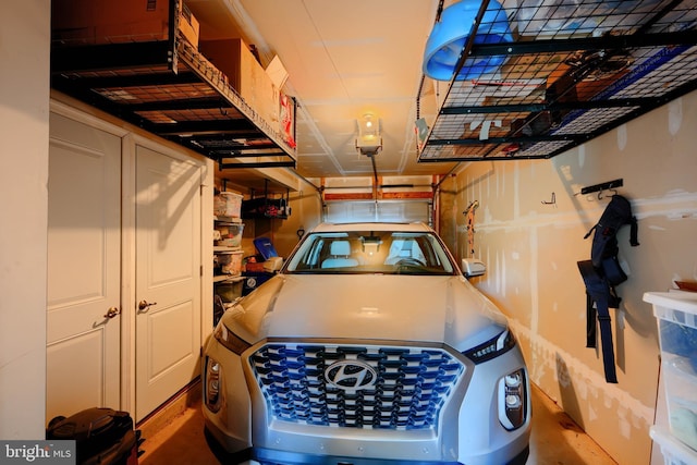 888 S Macon St, Baltimore, MD 21224 - garage featuring a garage door opener